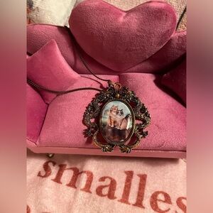 Ornate vintage kitty pendant